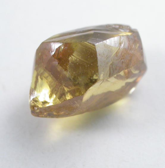 Diamond (0.91 carat cuttable fancy-intense-yellow elongated crystal) from Oranjemund District, southern coastal Namib Desert, Namibia