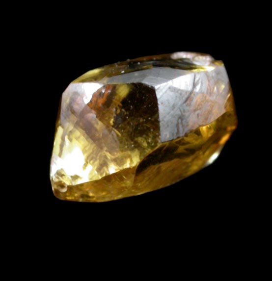 Diamond (0.91 carat cuttable fancy-intense-yellow elongated crystal) from Oranjemund District, southern coastal Namib Desert, Namibia