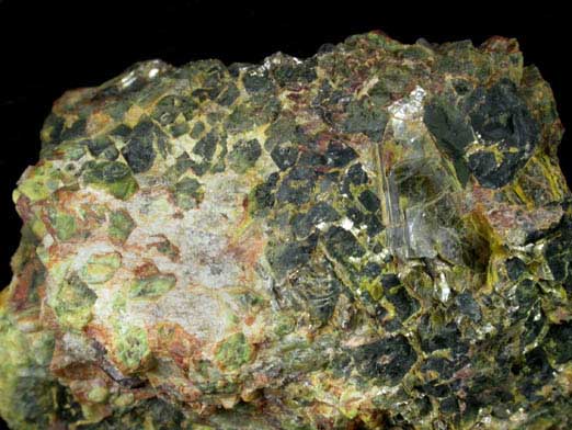 Uraninite with Uranophane, Gummite (Becquerelite-Fourmarierite) from Aldrich Quarry, Stoneham, Oxford County, Maine