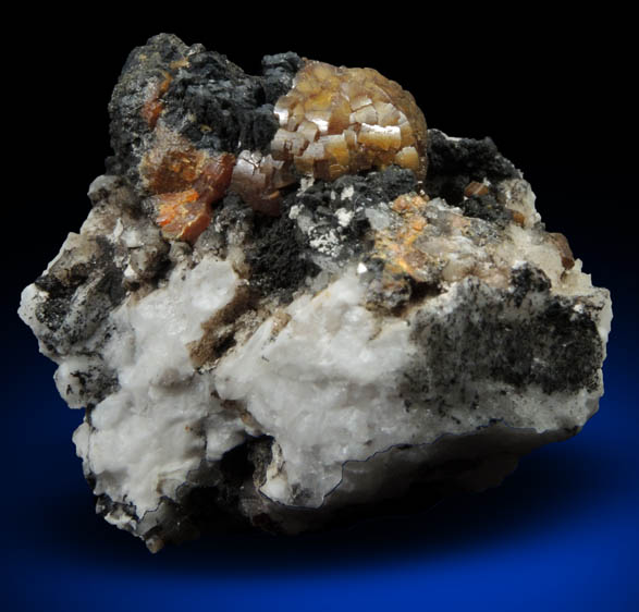 Mimetite var. Campylite on Barite with Psilomelane from Drygill Mine, Caldbeck Fells, Cumberland, England