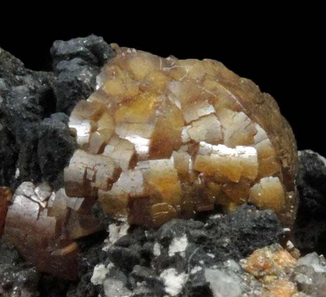 Mimetite var. Campylite on Barite with Psilomelane from Drygill Mine, Caldbeck Fells, Cumberland, England