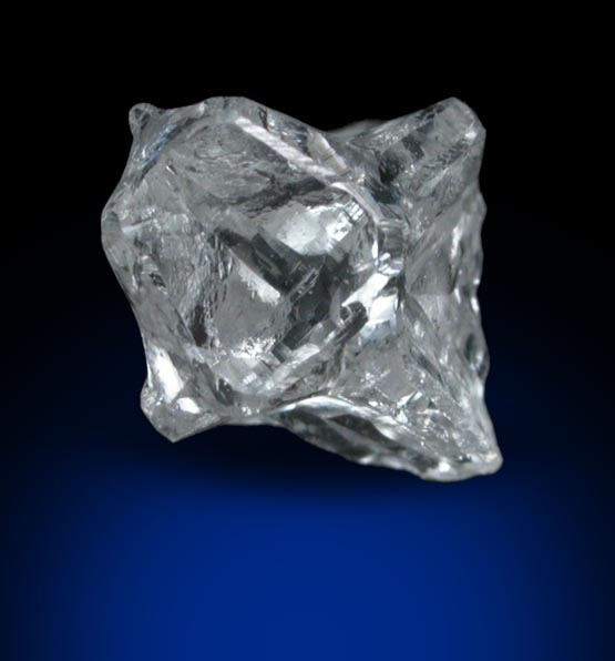Diamond (1.28 carat colorless cavernous crystal) from Mbuji-Mayi (Miba), 300 km east of Tshikapa, Democratic Republic of the Congo