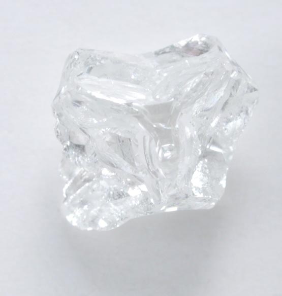 Diamond (1.28 carat colorless cavernous crystal) from Mbuji-Mayi (Miba), 300 km east of Tshikapa, Democratic Republic of the Congo