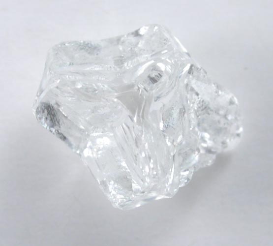 Diamond (1.28 carat colorless cavernous crystal) from Mbuji-Mayi (Miba), 300 km east of Tshikapa, Democratic Republic of the Congo
