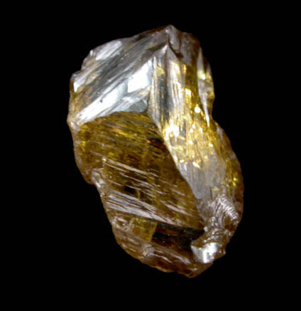 Diamond (0.55 carat fancy-intense yellow-orange asymmetric partial crystal) from Argyle Mine, Kimberley, Western Australia, Australia