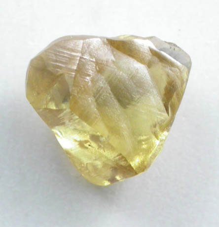 Diamond (0.41 carat fancy-intense yellow asymmetric crystal) from Argyle Mine, Kimberley, Western Australia, Australia