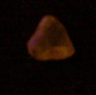 Diamond (0.41 carat fancy-intense yellow asymmetric crystal) from Argyle Mine, Kimberley, Western Australia, Australia