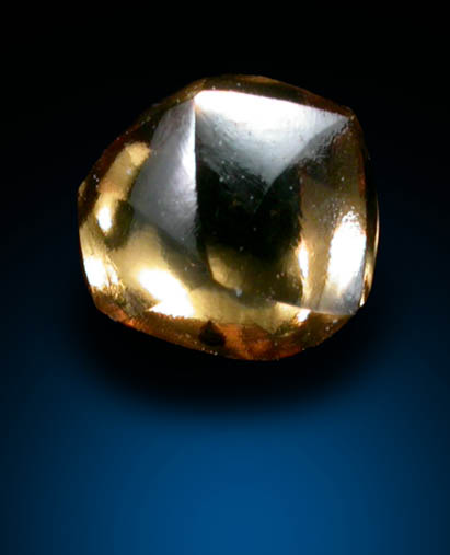 Diamond (0.42 carat fancy-orange flattened dodecahedral crystal) from Argyle Mine, Kimberley, Western Australia, Australia