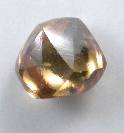 Diamond (0.42 carat fancy-orange flattened dodecahedral crystal) from Argyle Mine, Kimberley, Western Australia, Australia