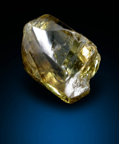 Diamond (0.53 carat fancy-yellow elongated dodecahedral crystal) from Argyle Mine, Kimberley, Western Australia, Australia