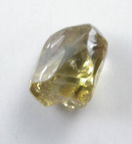 Diamond (0.53 carat fancy-yellow elongated dodecahedral crystal) from Argyle Mine, Kimberley, Western Australia, Australia