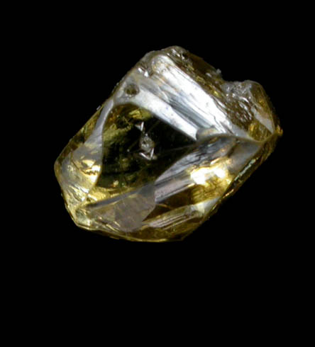 Diamond (0.53 carat fancy-yellow elongated dodecahedral crystal) from Argyle Mine, Kimberley, Western Australia, Australia