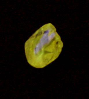 Diamond (0.53 carat fancy-yellow elongated dodecahedral crystal) from Argyle Mine, Kimberley, Western Australia, Australia