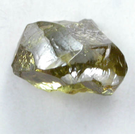 Diamond (0.47 carat fancy-greenish-yellow elongated partial crystal) from Argyle Mine, Kimberley, Western Australia, Australia