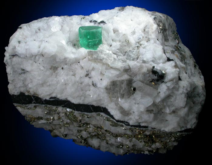 Beryl var. Emerald in Calcite with Pyrite from Muzo Mine, Vasquez-Yacop District, Boyac Department, Colombia