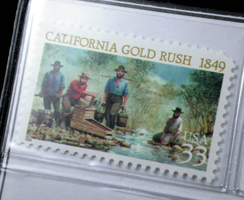 Gold nugget (plus California Gold Rush 1849 commemorative stamp) from Mother Lode District, California