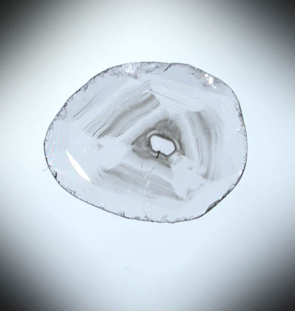 Diamond (0.47 carat polished slice with sector-zoned inclusions) from Zimbabwe