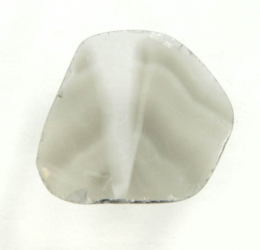 Diamond (0.28 carat polished slice with sector-zoned inclusions) from Zimbabwe