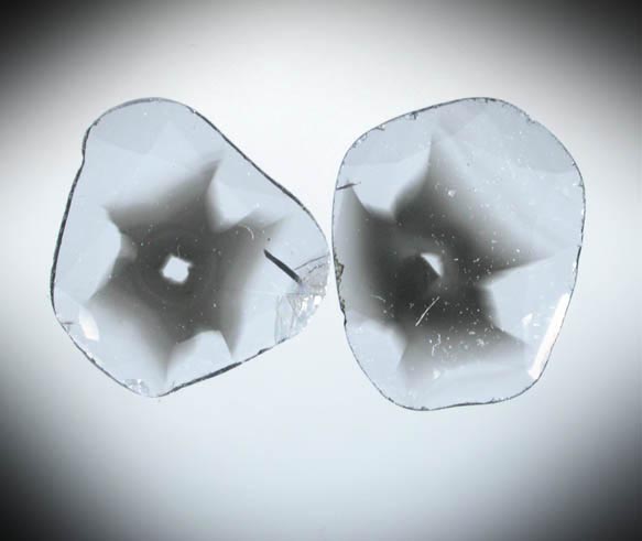 Diamond (two matched polished slices with sector-zoned inclusions totaling 0.85 carats) from Zimbabwe