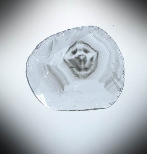 Diamond (0.28 carat polished slice with sector-zoned inclusions) from Zimbabwe