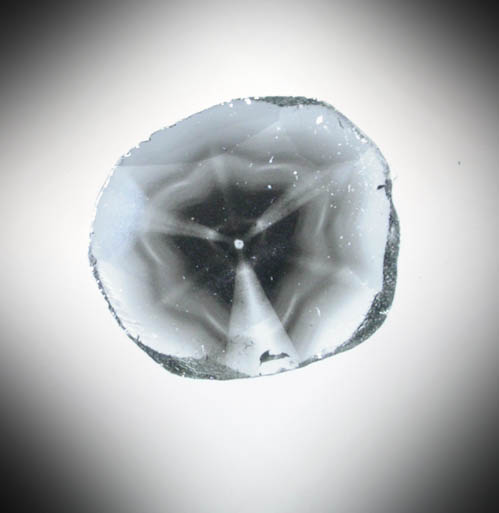 Diamond (0.21 carat polished slice with sector-zoned inclusions) from Zimbabwe