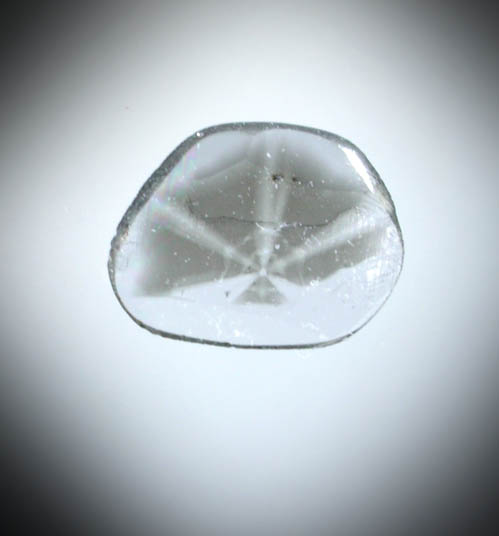 Diamond (0.11 carat polished slice with sector-zoned inclusions) from Zimbabwe
