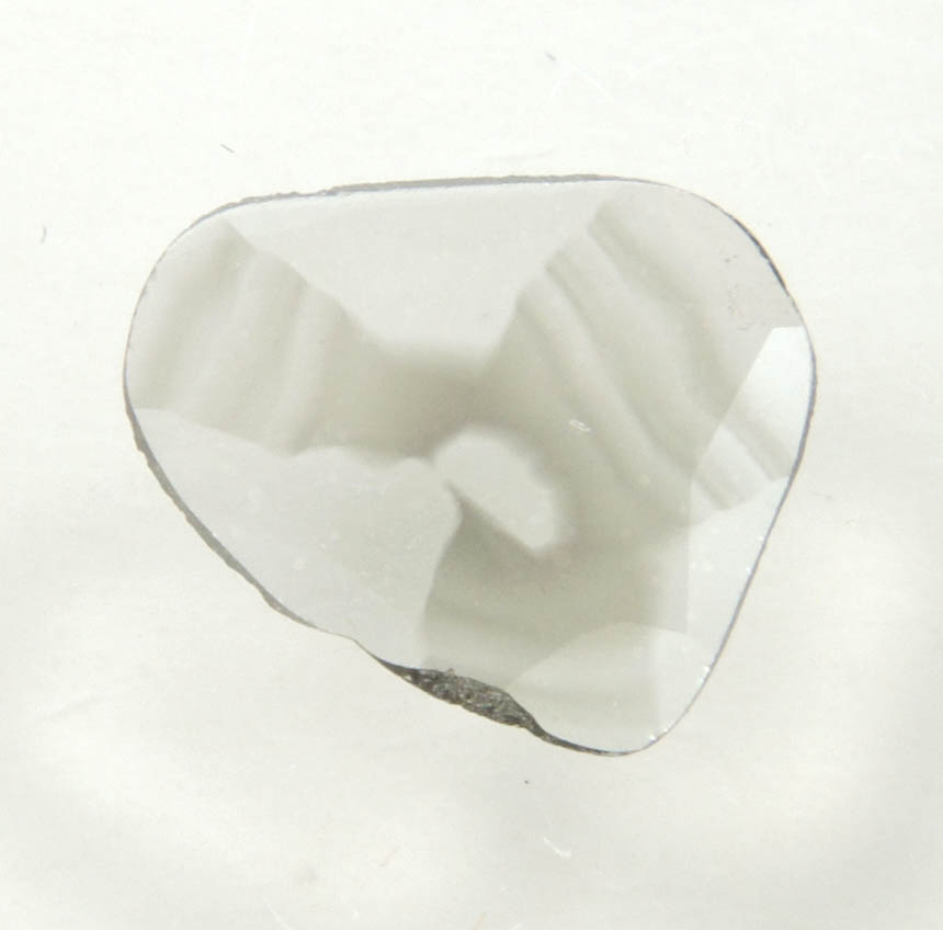 Diamond (0.24 carat polished slice with sector-zoned inclusions) from Zimbabwe