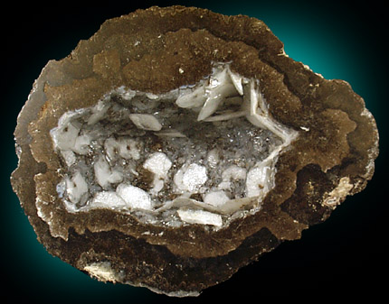Calcite in Quartz lined geode from Chihuahua, Mexico