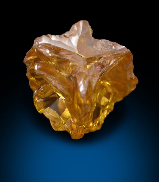 Diamond (0.61 carat fancy intense yellow cavernous crystal) from Mbuji-Mayi (Miba), 300 km east of Tshikapa, Democratic Republic of the Congo