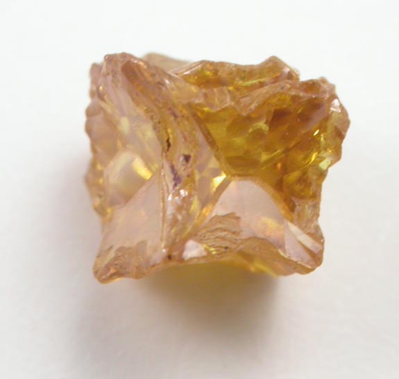 Diamond (0.61 carat fancy intense yellow cavernous crystal) from Mbuji-Mayi (Miba), 300 km east of Tshikapa, Democratic Republic of the Congo