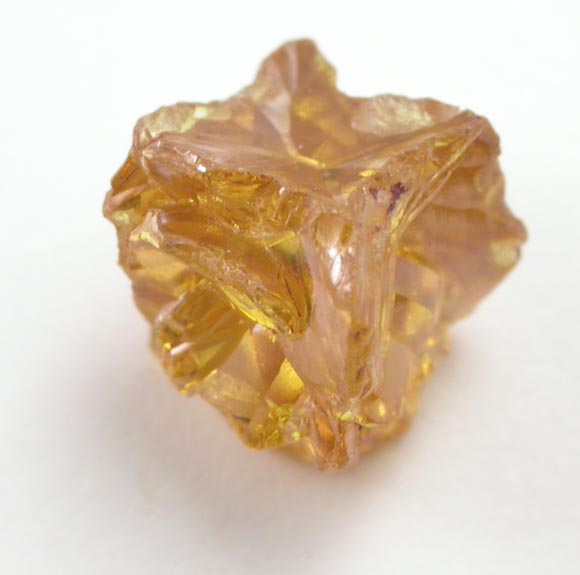 Diamond (0.61 carat fancy intense yellow cavernous crystal) from Mbuji-Mayi (Miba), 300 km east of Tshikapa, Democratic Republic of the Congo