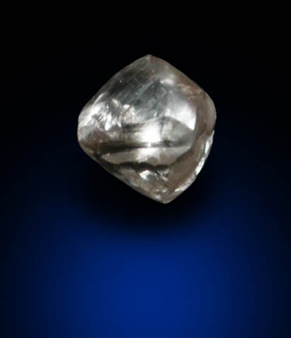 Diamond (0.05 carat pale-brown octahedral crystal) from Fuxian, Lianing Province, China