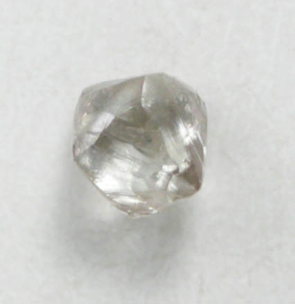 Diamond (0.05 carat pale-brown octahedral crystal) from Fuxian, Lianing Province, China