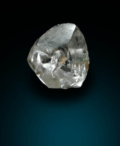 Diamond (0.09 carat pale-brown complex crystal) from Fuxian, Lianing Province, China