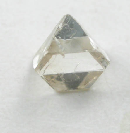 Diamond (0.10 carat pale-brown octahedral crystal) from Fuxian, Lianing Province, China