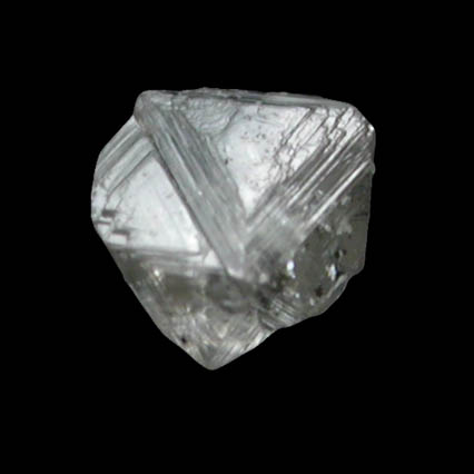 Diamond (0.06 carat pale-brown macle, twinned crystal) from Fuxian, Lianing Province, China