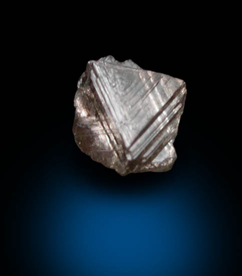 Diamond (0.10 carat brown macle, twinned crystal) from Fuxian, Lianing Province, China