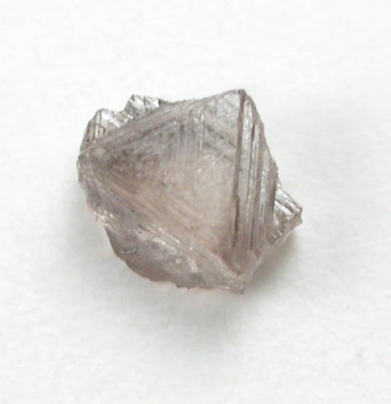 Diamond (0.10 carat brown macle, twinned crystal) from Fuxian, Lianing Province, China