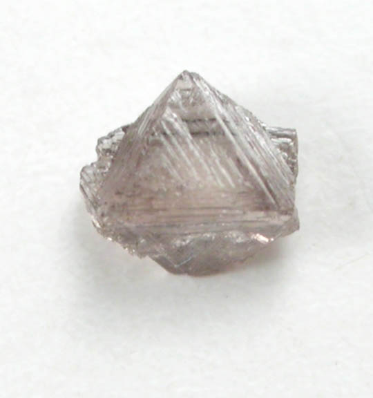 Diamond (0.10 carat brown macle, twinned crystal) from Fuxian, Lianing Province, China