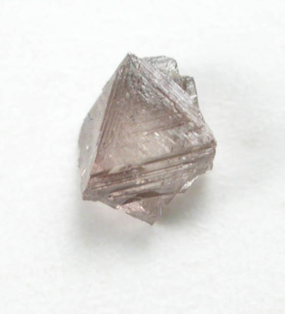 Diamond (0.10 carat brown macle, twinned crystal) from Fuxian, Lianing Province, China