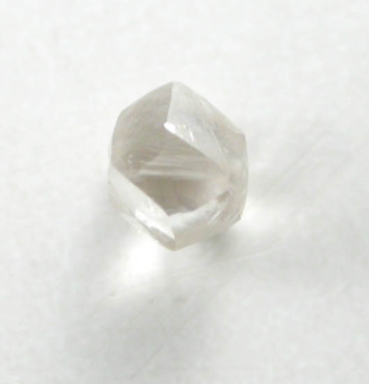 Diamond (0.04 carat pale-brown dodecahedral crystal) from Fuxian, Lianing Province, China