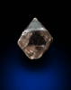 Diamond (0.04 carat pale-brown octahedral crystal) from Fuxian, Lianing Province, China