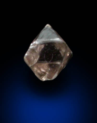 Diamond (0.04 carat pale-brown octahedral crystal) from Fuxian, Lianing Province, China