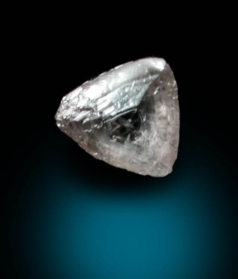 Diamond (0.03 carat pale-brown macle, twinned crystal) from Fuxian, Lianing Province, China