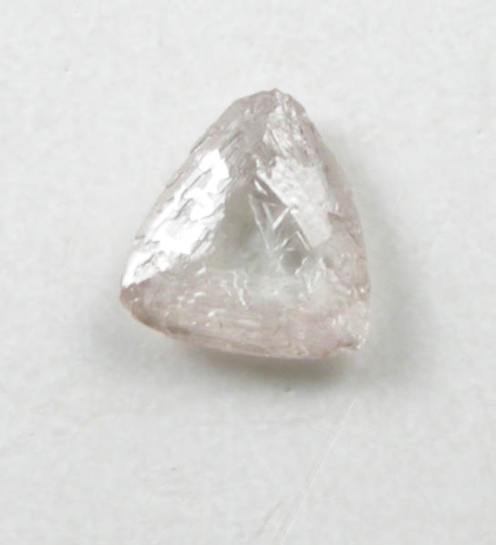 Diamond (0.03 carat pale-brown macle, twinned crystal) from Fuxian, Lianing Province, China