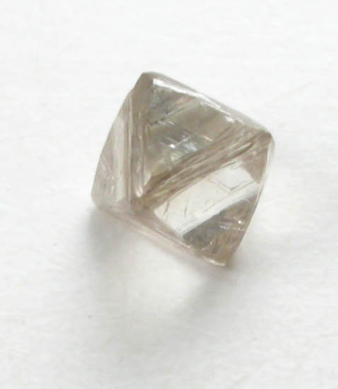 Diamond (0.09 carat pale-brown octahedral crystal) from Fuxian, Lianing Province, China
