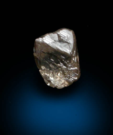 Diamond (0.10 carat pale-brown octahedral crystal) from Fuxian, Lianing Province, China