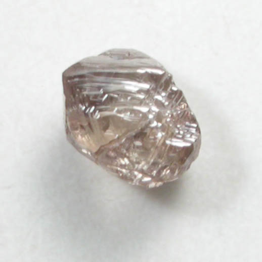 Diamond (0.10 carat pale-brown octahedral crystal) from Fuxian, Lianing Province, China