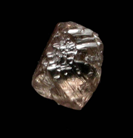 Diamond (0.10 carat pale-brown octahedral crystal) from Fuxian, Lianing Province, China