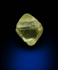 Diamond (0.05 carat yellow octahedral crystal) from Fuxian, Lianing Province, China